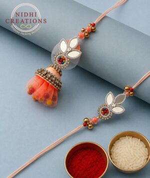 Peach Mirror Lotus Pair Rakhi Set